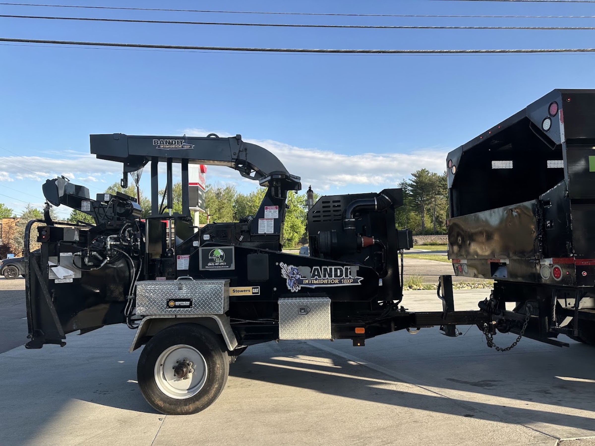 The Elite Tree Service truck and chipper ready for a job in Knox County