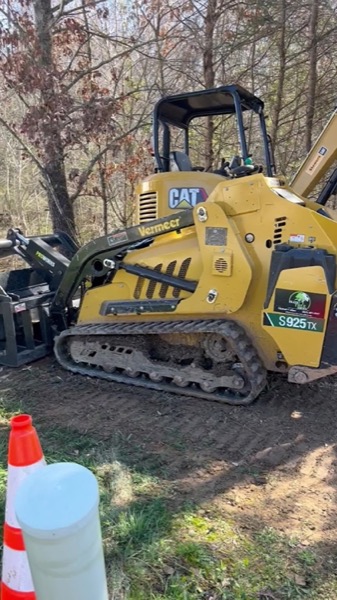 The Elite Tree Service grapple truck on site